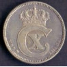25 Øre. Chr. X. 1915 i en middelgod kvalitet for type og årstal.