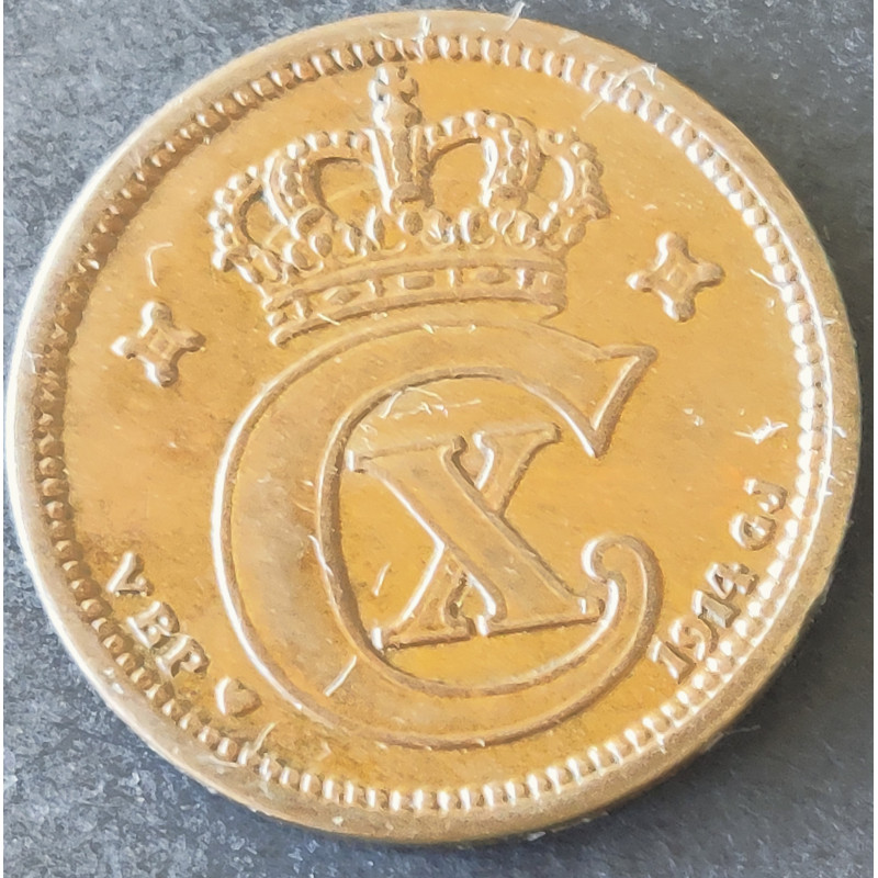 2 Øre. Chr. X. 1914 i en middelgod kvalitet for type og årstal.