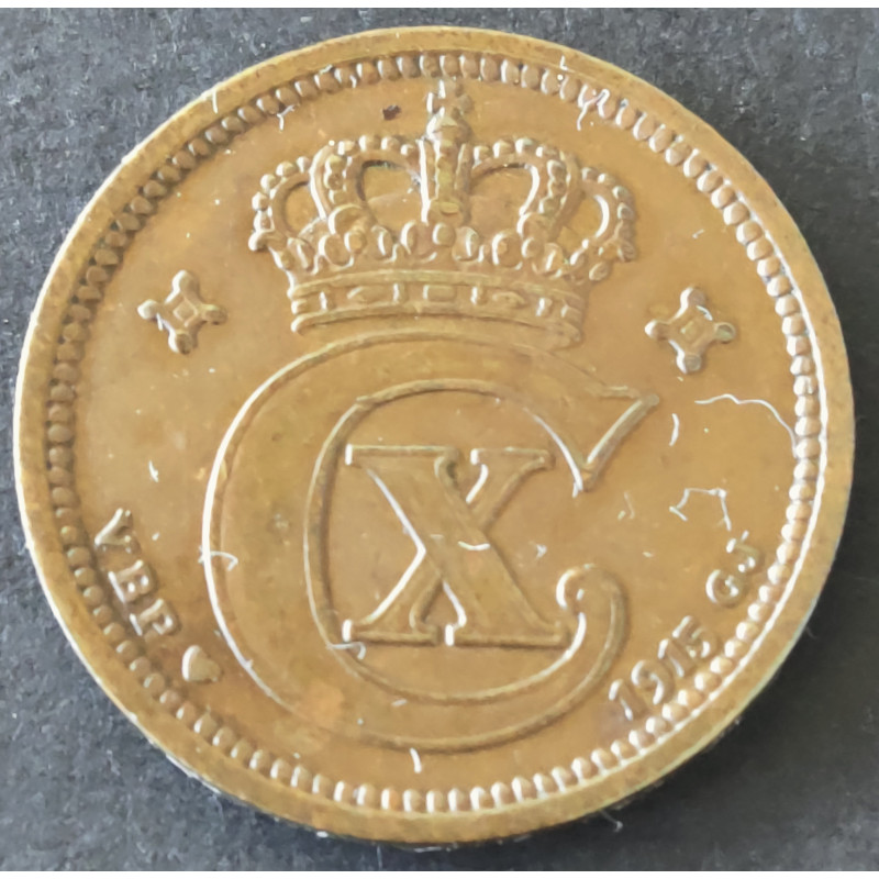 2 Øre. Chr. X. 1915 i en middelgod kvalitet for type og årstal.