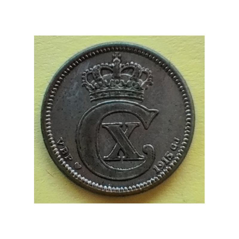 10 Øre. Chr. X. 1915 i en middelgod kvalitet for type og årstal.